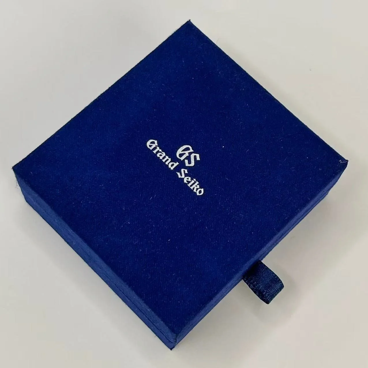 Grand Seiko Blue Leather 3-Slot Watch Case with Gold Clasp and